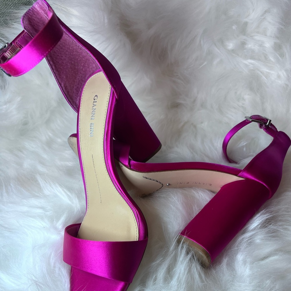 Beautiful hot pink Women's high heels only work once.